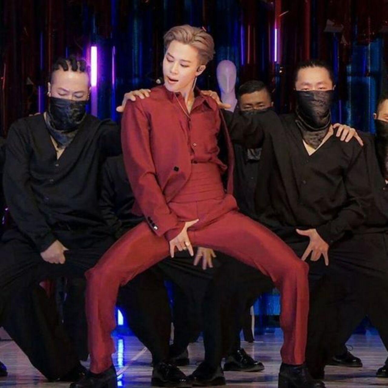 The temperature is rising faster than we can keep up - Jimin truly embraced some gender-bending and bold ensembles during the online performances for his single, 'Filter.' An all-red sexy silken suit, with face? With that voice? You can bet that our jaws dropped when Jimin made a dramatic entry in this fit during the song