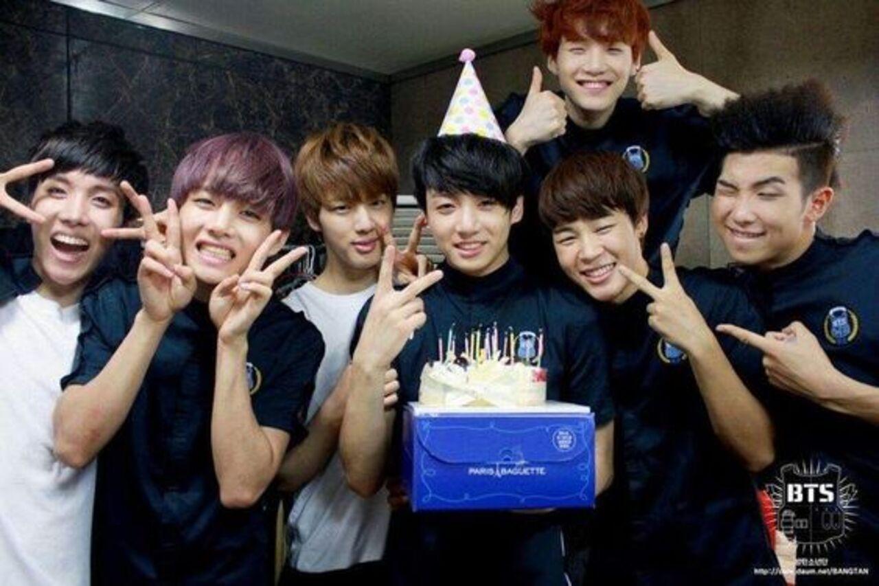 Jungkook may be the most reliable youngest member that his members lean on - but they make sure their Golden Maknae gets his fair share of pampering too. For JK's first birthday with the group, they surprised him with a cake, music and a party - all amidst a hectic pratice schedule 