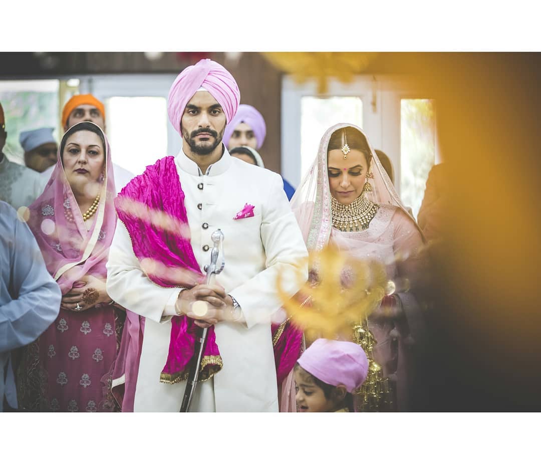 Their wedding pictures are seriously next-level stunning, right? Neha and Angad are just rocking that whole 'power couple' vibe effortlessly.