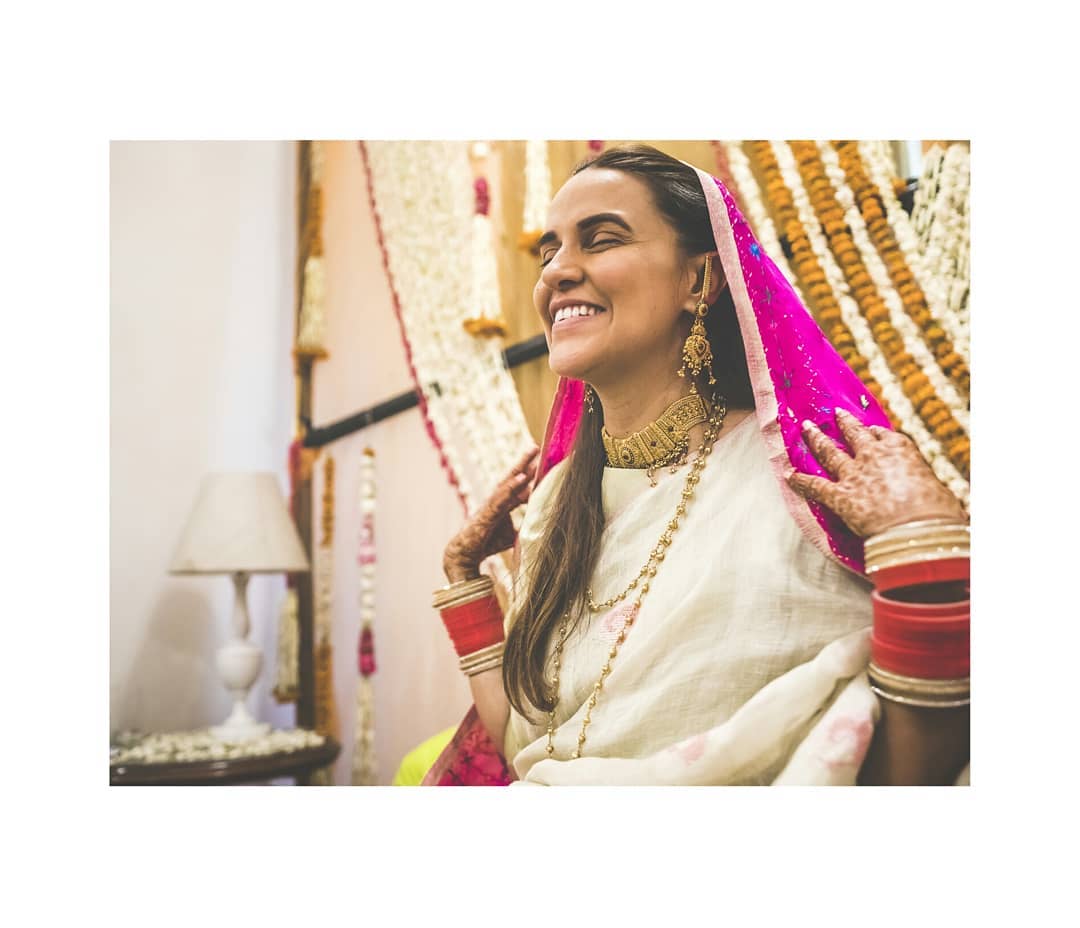 Neha Dhupia and Angad Bedi embraced the sanctity of a traditional Sikh wedding ceremony known as Anand Karaj.