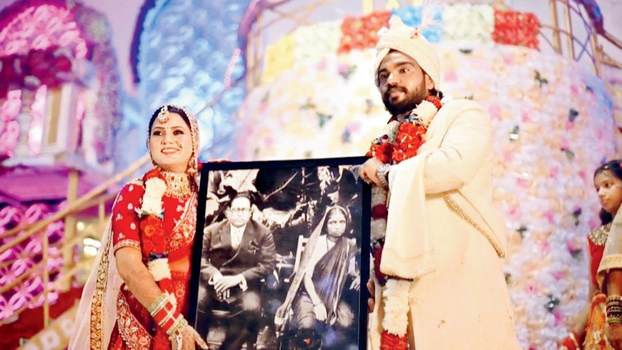 Sahil Valmiki, co-founder and editor of Dalit Desk with wife Babita Gautam, founding editor, The Voice Media and co-founder of Dalit Desk, at their Ambedkarite Buddhist wedding in Delhi in 2022 