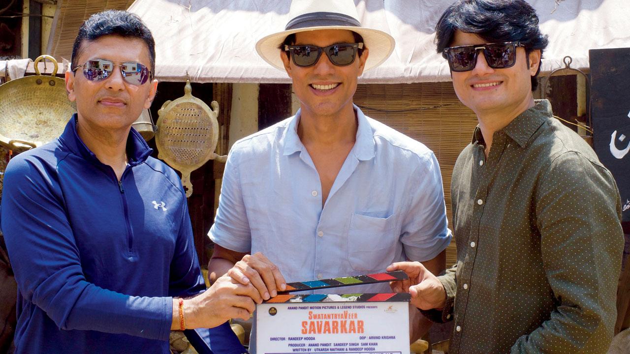(From left) Anand Pandit, Randeep Hooda and Sandeep Singh at the muhurat shot