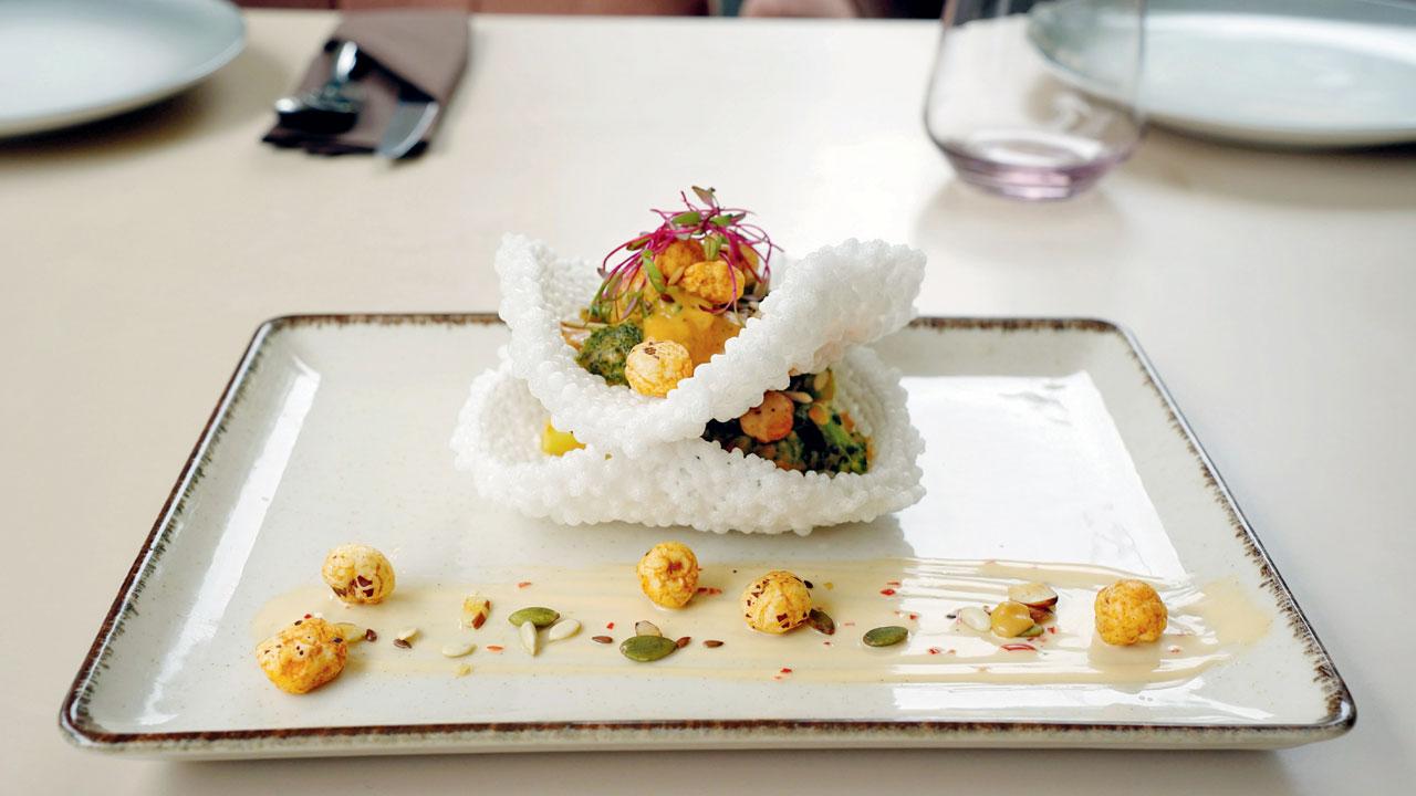 Creole broccoli florets and fox nut in sago basket