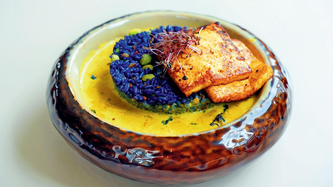 Rendang curry with edamame blue pea rice grilled cottage cheese
