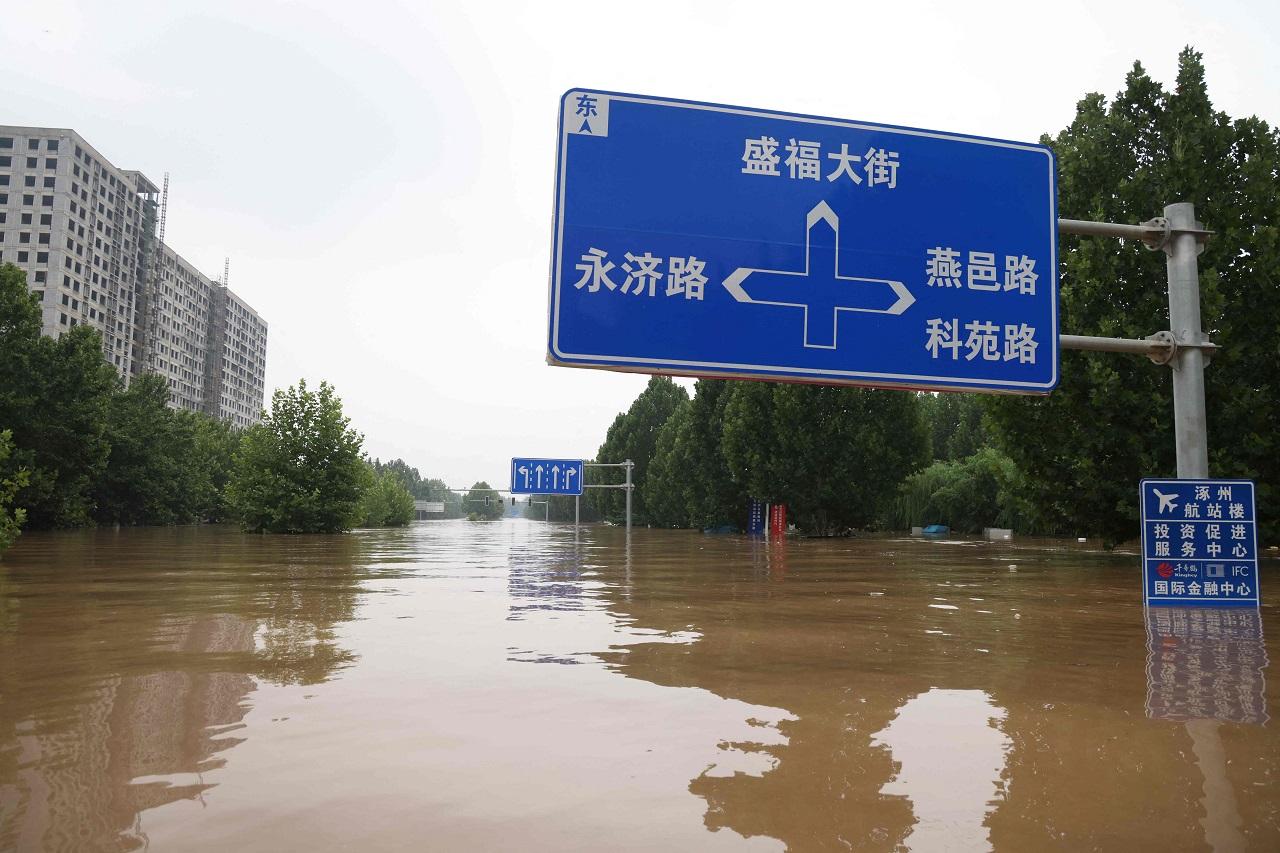Rescue teams traversed the flooded city in rubber boats as they evacuated residents who were stuck in their homes without running water, gas or electricity since Tuesday afternoon
