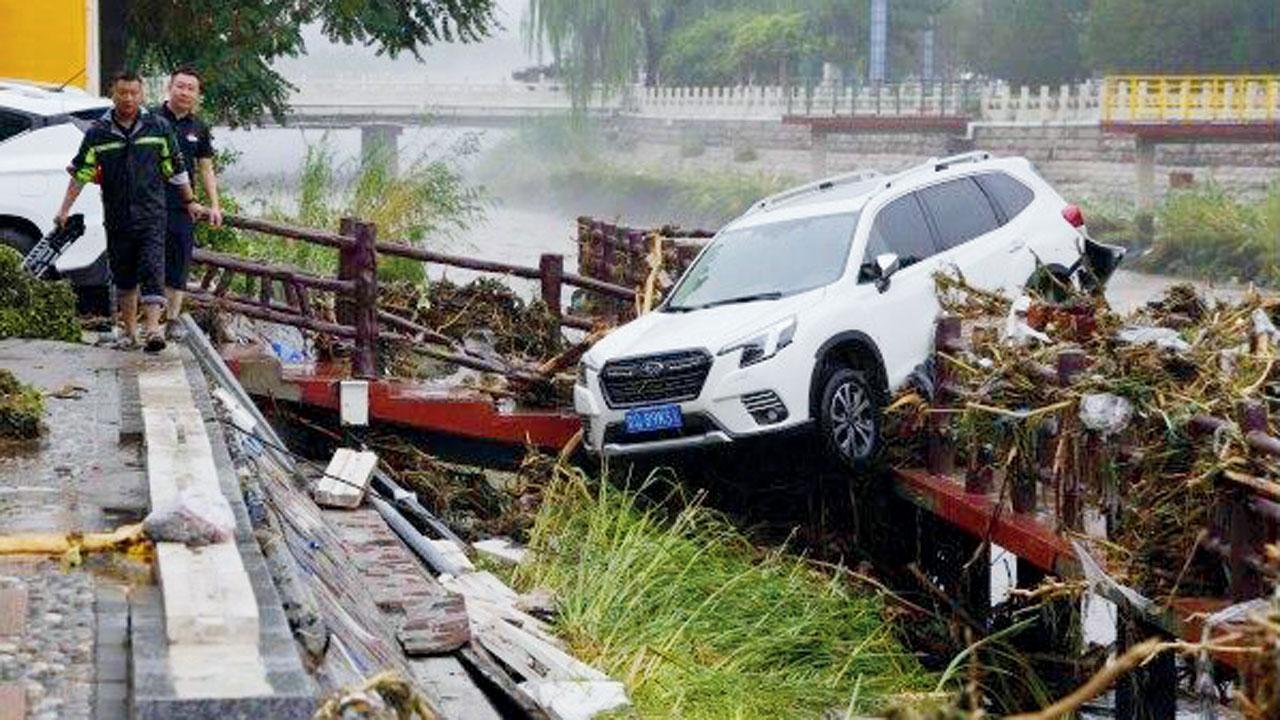 Floods in China leave 20 dead, 27 missing