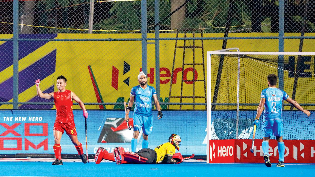 China’s Wenhui E celebrates a goal against India. Pics/Hockey India