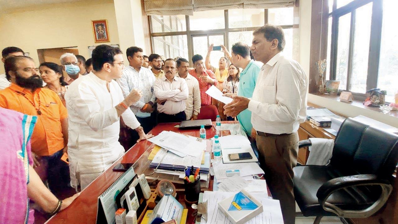 Kalyan MP Shrikant Shinde speaks to one of the hospital authorities on Monday