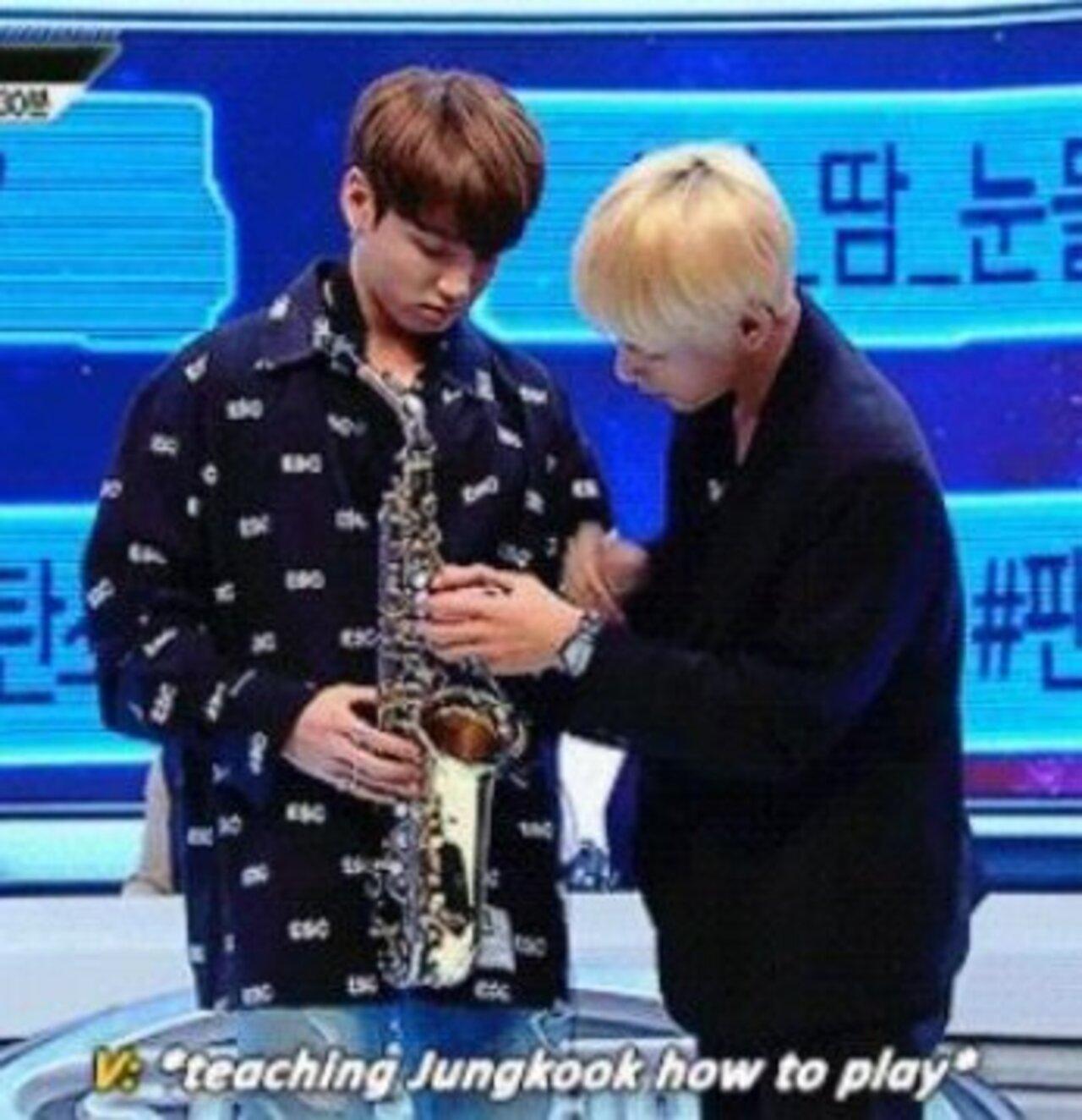 BTS's JK was always a prodigious talent when it came to all things musical. Taehyung has often stated that he used to play the saxophone as a high school student - and this moment captured him trying to teach the instrument to Jungkook on a reality show. However, what blew ARMY away was that Jungkook surpassed even Taehyung's abilities - and all on the first try!