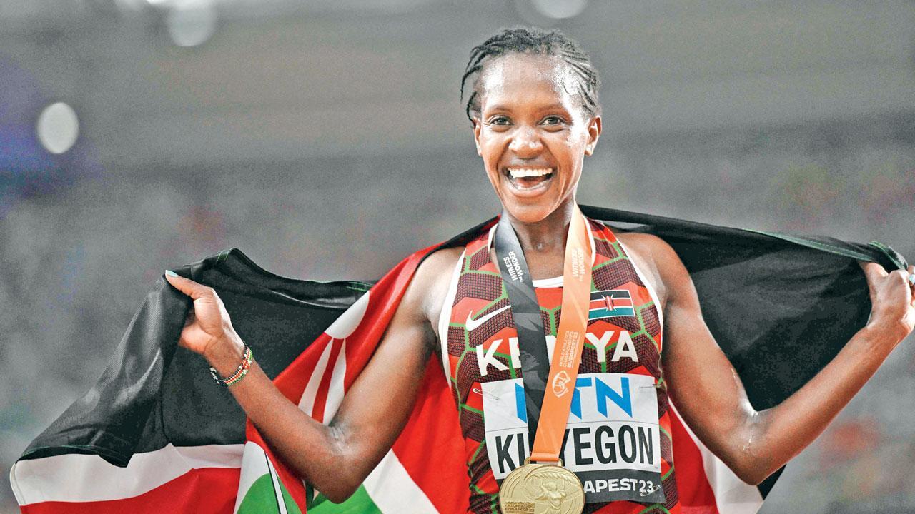 Kenya’s Faith Kipyegon wins world 5,000m for historic double