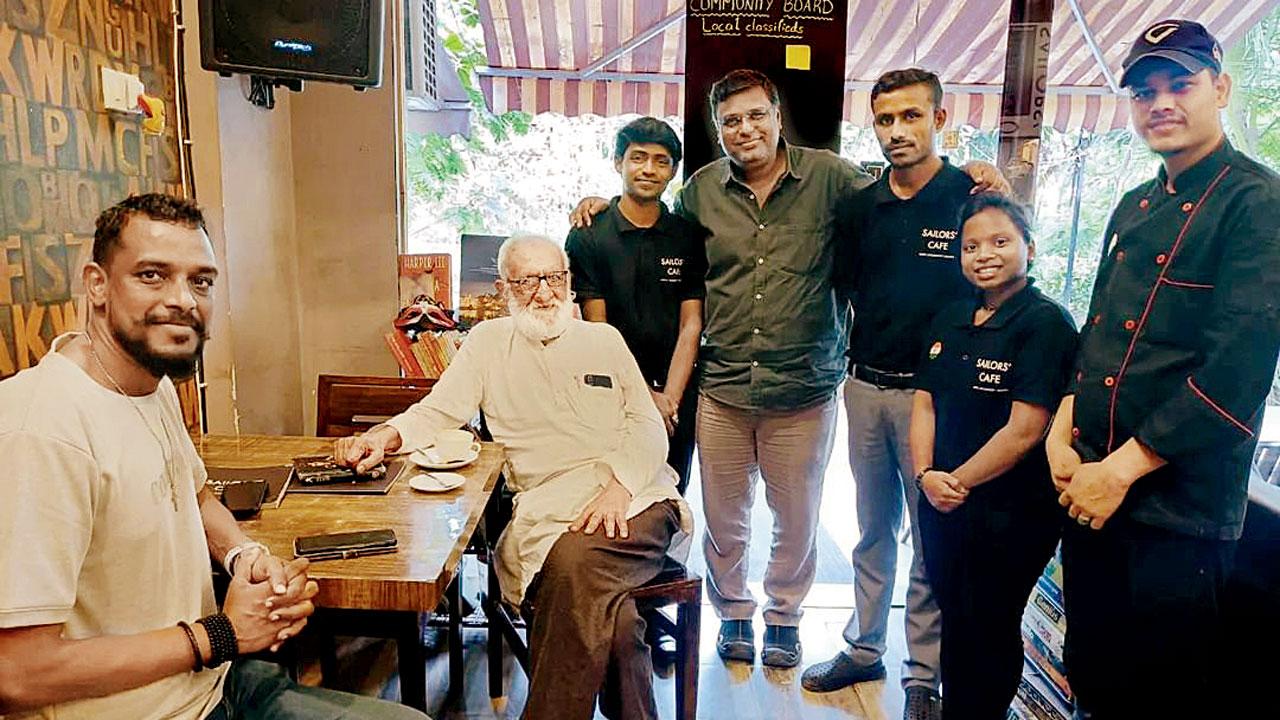 (From left) Jackson Jacob, GG Parikh, Richard Jacob (in green) with the cafe employees. Pic Courtesy/@SailorsCafeBelapur
