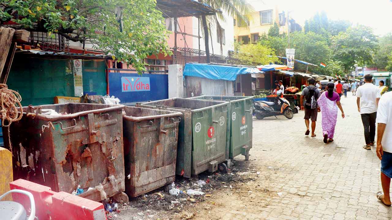 The garbage bins placed right near the entrance of Tridha School in Andheri East. Pic/Anurag Ahire