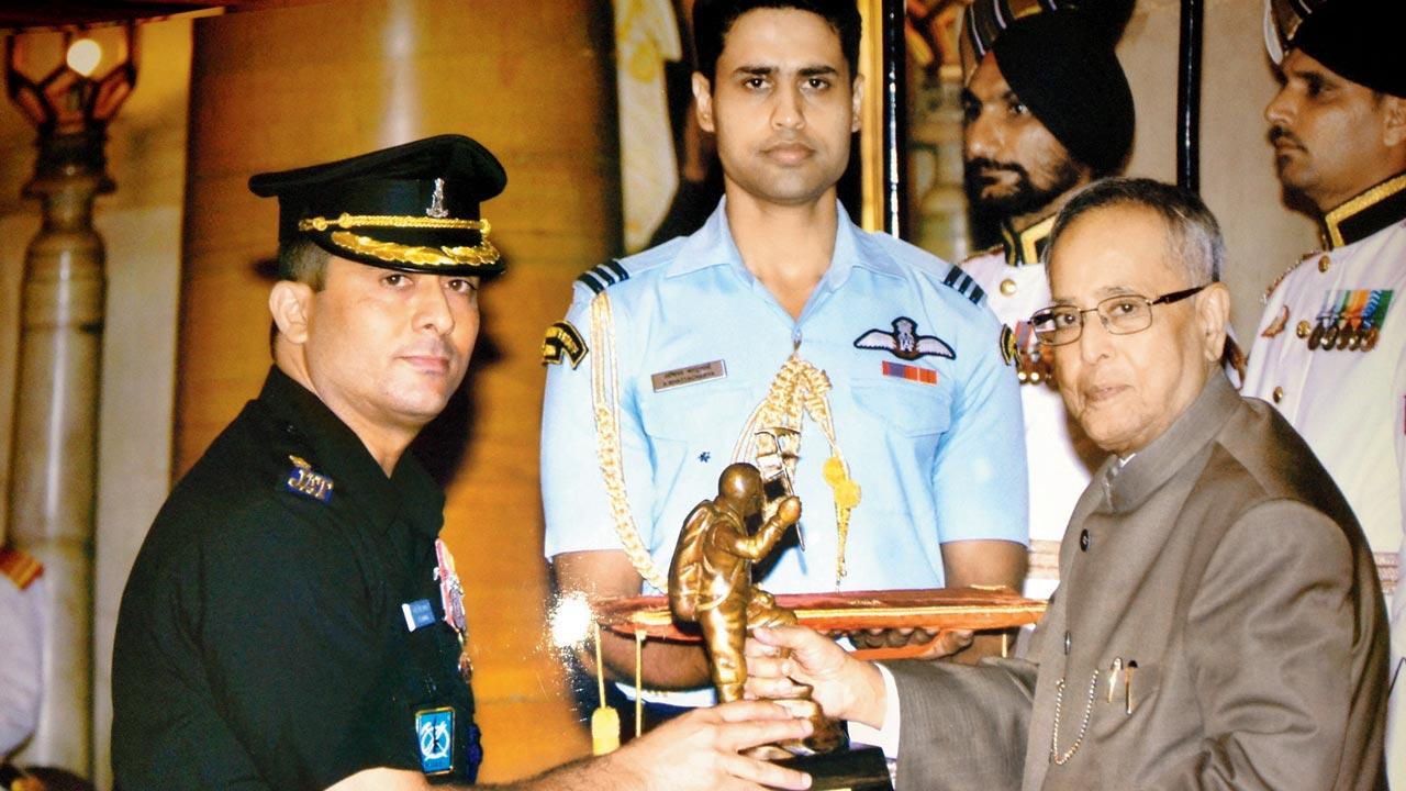 Receiving the Tenzing Norgay National Adventure Award at the hands of President Pranab Mukherjee