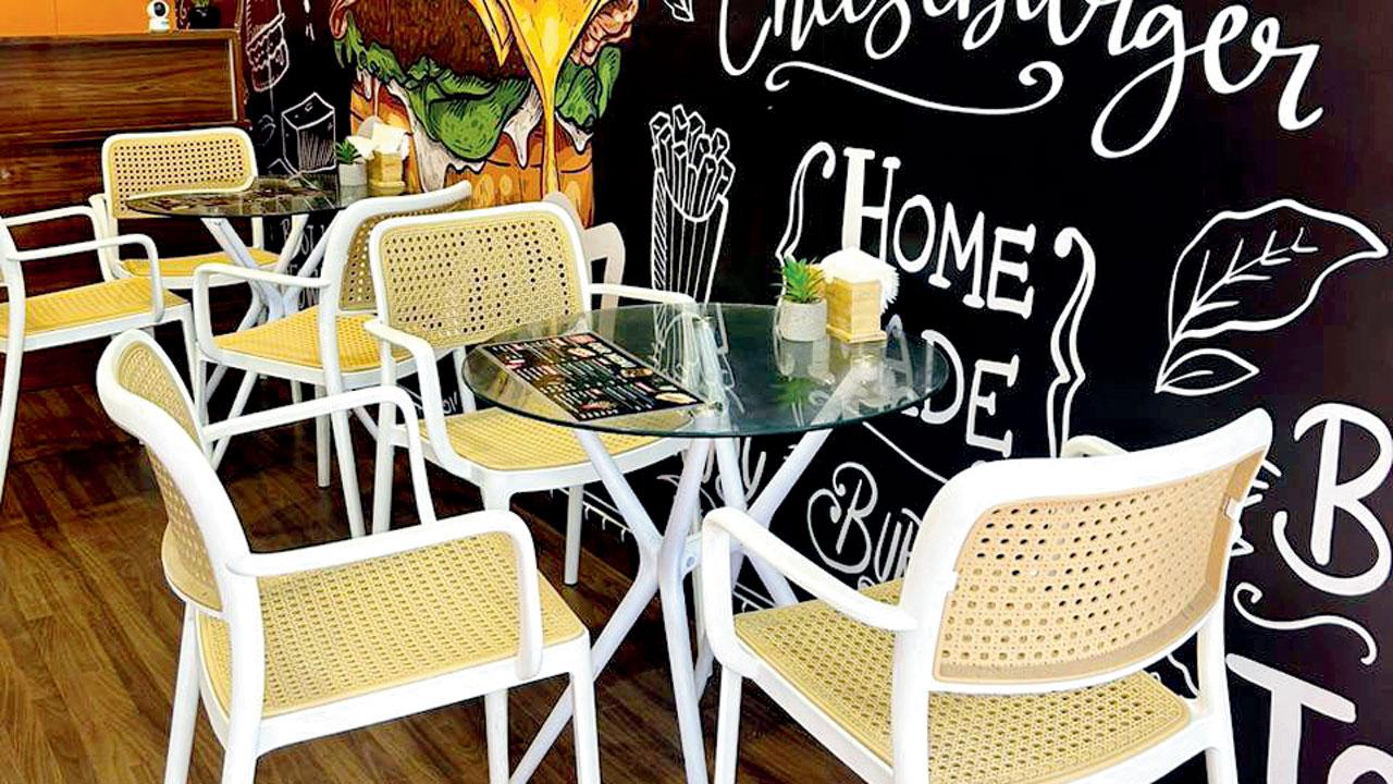 The colourful graffiti  on the right wall of the space livens up the restaurant