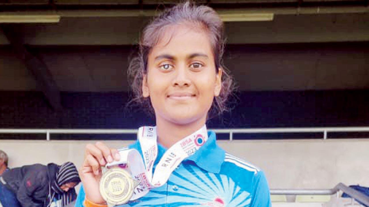 Deepika TC with her gold medal 
