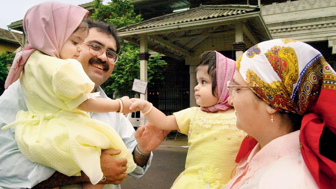 Kushnaz and Khushnuma with their parents on Parsi New Year in 2001.  Pic/Ashish Raje