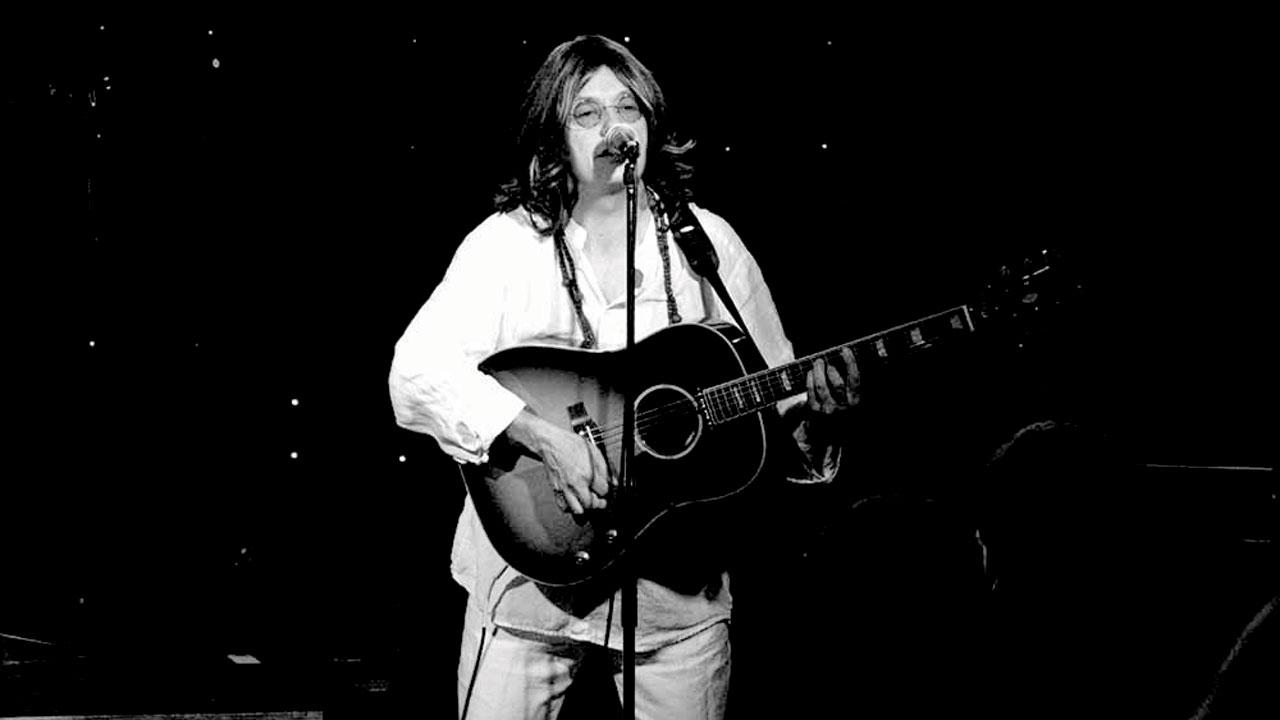 Lifelong Beatles fan, Mike Moundford, plays John Lennon in the band’s performances