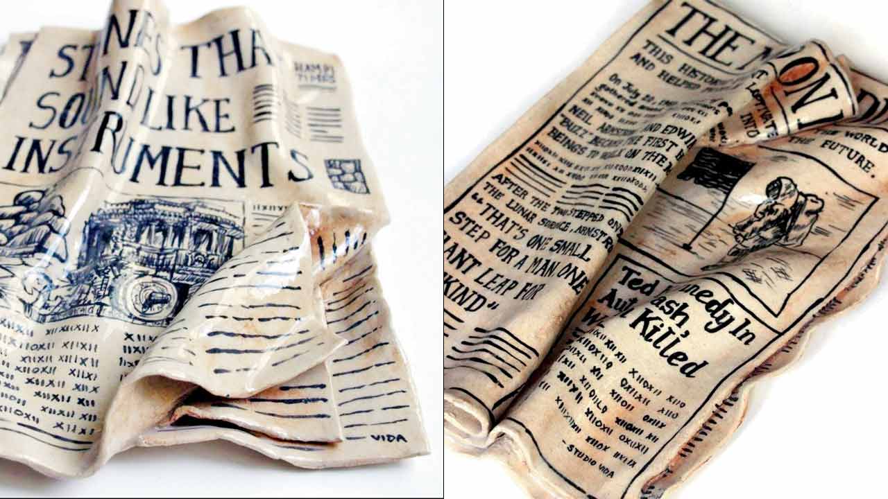 Two life-sized newspapers from Studio Vida’s paper work series
