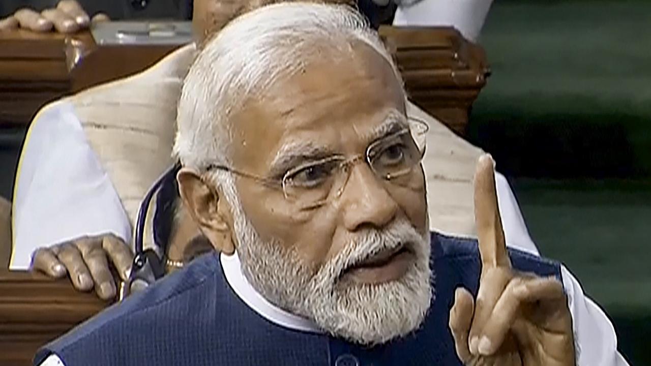 IN PHOTOS: PM Narendra Modi replies to debate on no-confidence motion