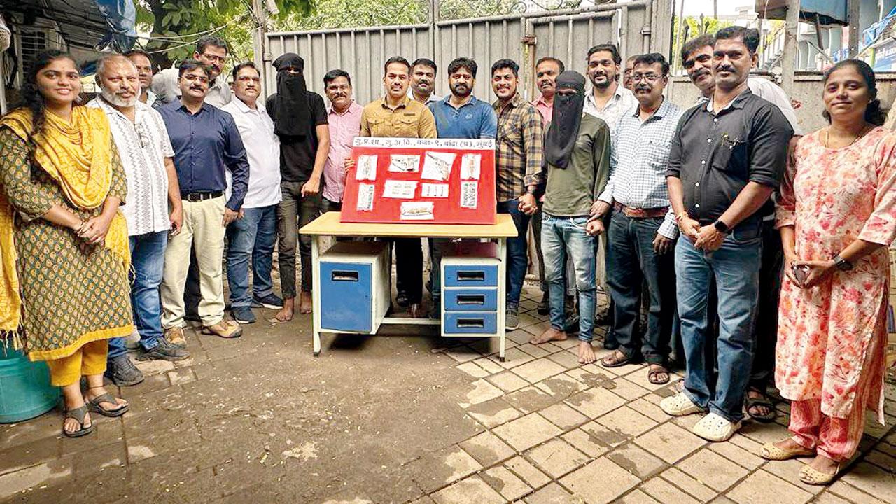 Unit 09 team with accused and recovered weapons