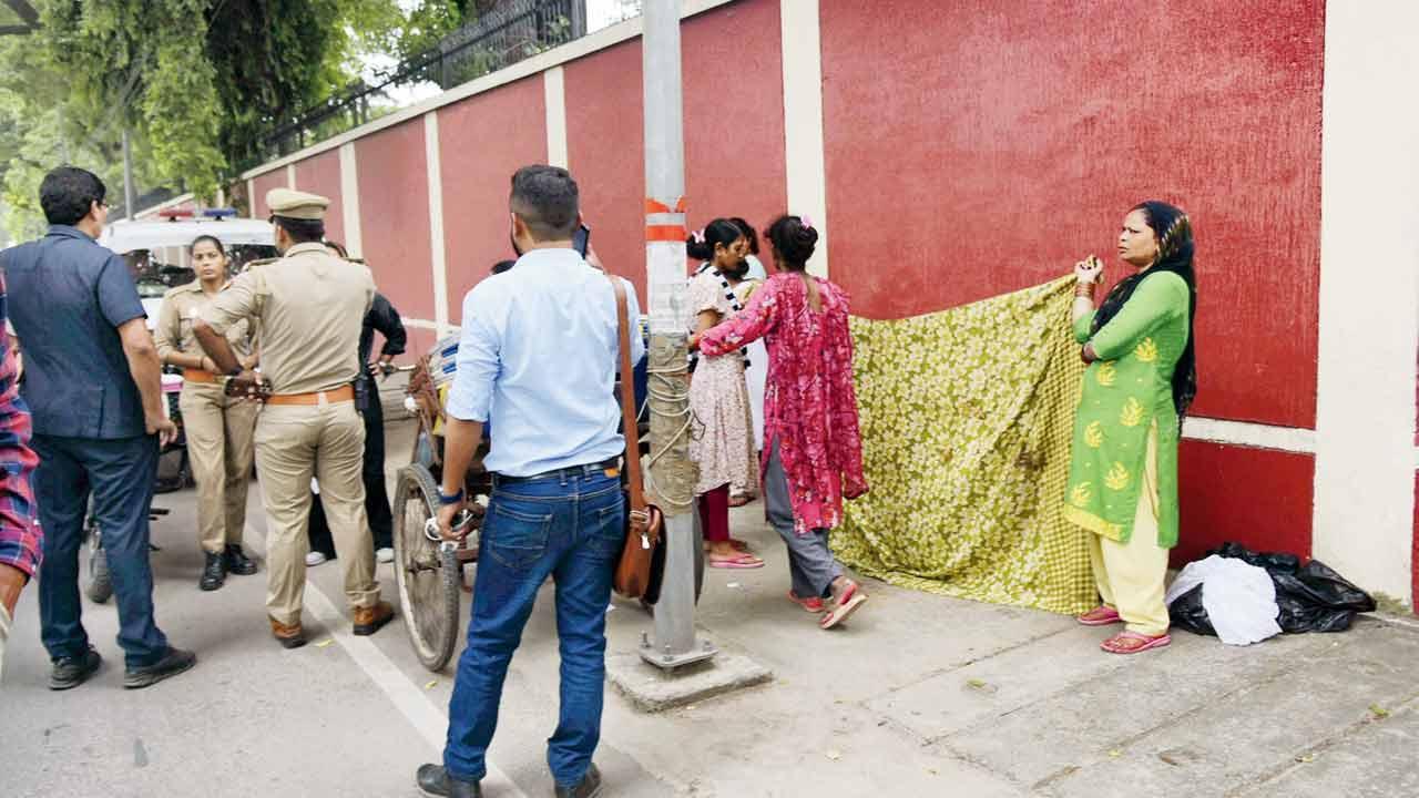 Opposition slams UP govt as woman delivers at Raj Bhavan gate
