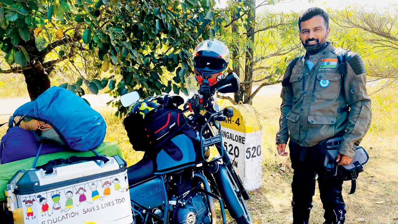 Ram Mohan KM with his bike. Pic Courtesy/Demosh Rao