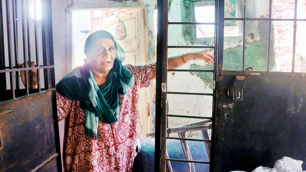 Sakhubai Kangne, 60, in the remnants of her home near Gokhale bridge in Andheri East on Tuesday. Pic/Anurag Ahire