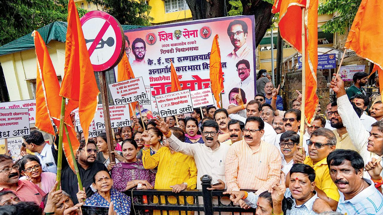 Shiv Sena (UBT) workers protest outside KEM Hospital on Tuesday. Pic/PTI