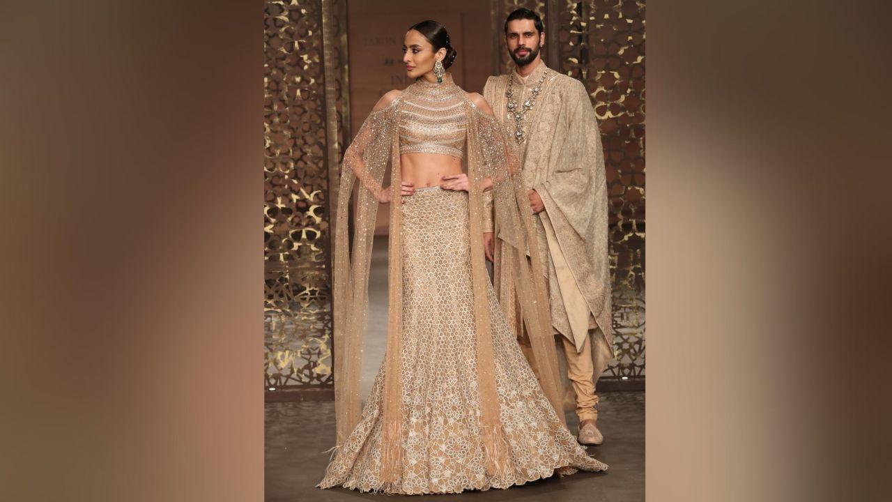 The collection with Bridal Heritage for bridalwear draws inspiration from the rich heritage of India, Egypt, and Persia, where ancient Mughal and Egyptian jaali motifs converge with Mumbai's Art Deco trellises. Hand-embroidered panels, exquisite hand-painted prints, and meticulous stitches create a poetic tapestry that unfolds through draped lehengas, kurtas, shararas, and sarees, exuding fluidity, feminine elegance, and a touch of festive magic.