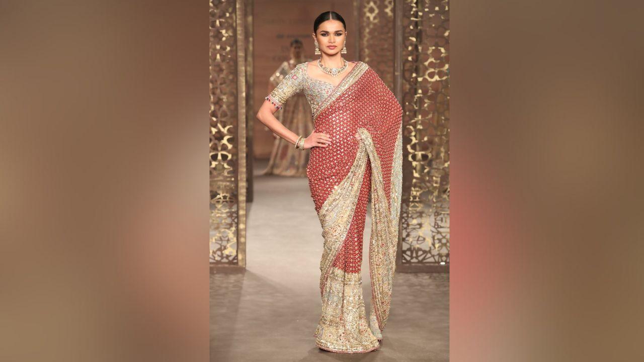 With over 90 bespoke looks, including standout pieces like the green onyx and real freshwater pearl blouse, each bride and groom is invited to discover their unique expression within this diverse spectrum of colors, crafts, and silhouettes. 