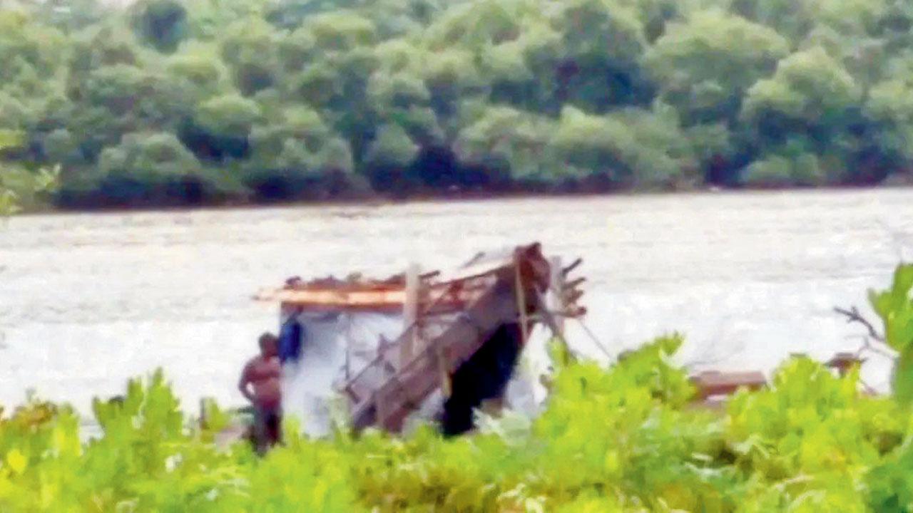 Picture of a sand mining site, with residential towers in the background, at Kharghar, from mid-day’s report on the sand mafia at Taloja creek in 2022. File pic