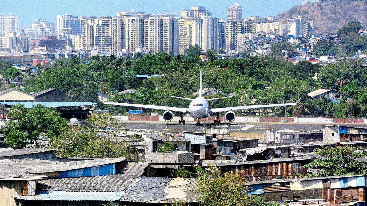 A cargo plane as seen from Kurla, ready to take off from Chhatrapati Shivaji Maharaj International Airport. Pic/Satej Shinde