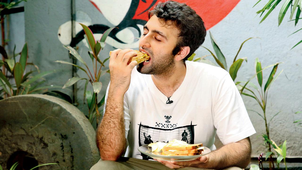 Funny man Zervaan Bunshah loves the club sandwich at Cafe 749, Dadar West. Pic/Raj Patil