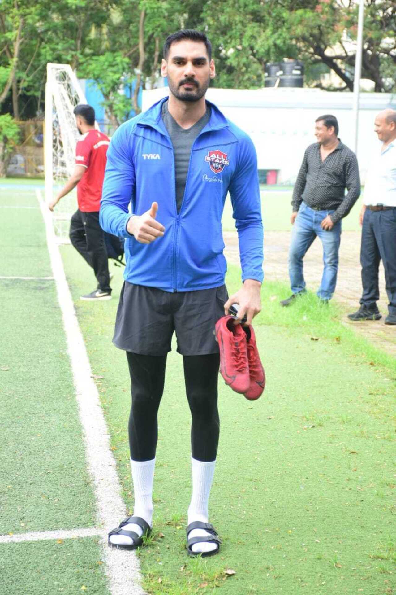 Ahan Shetty wore blue track and black shorts as he went for his practice session
