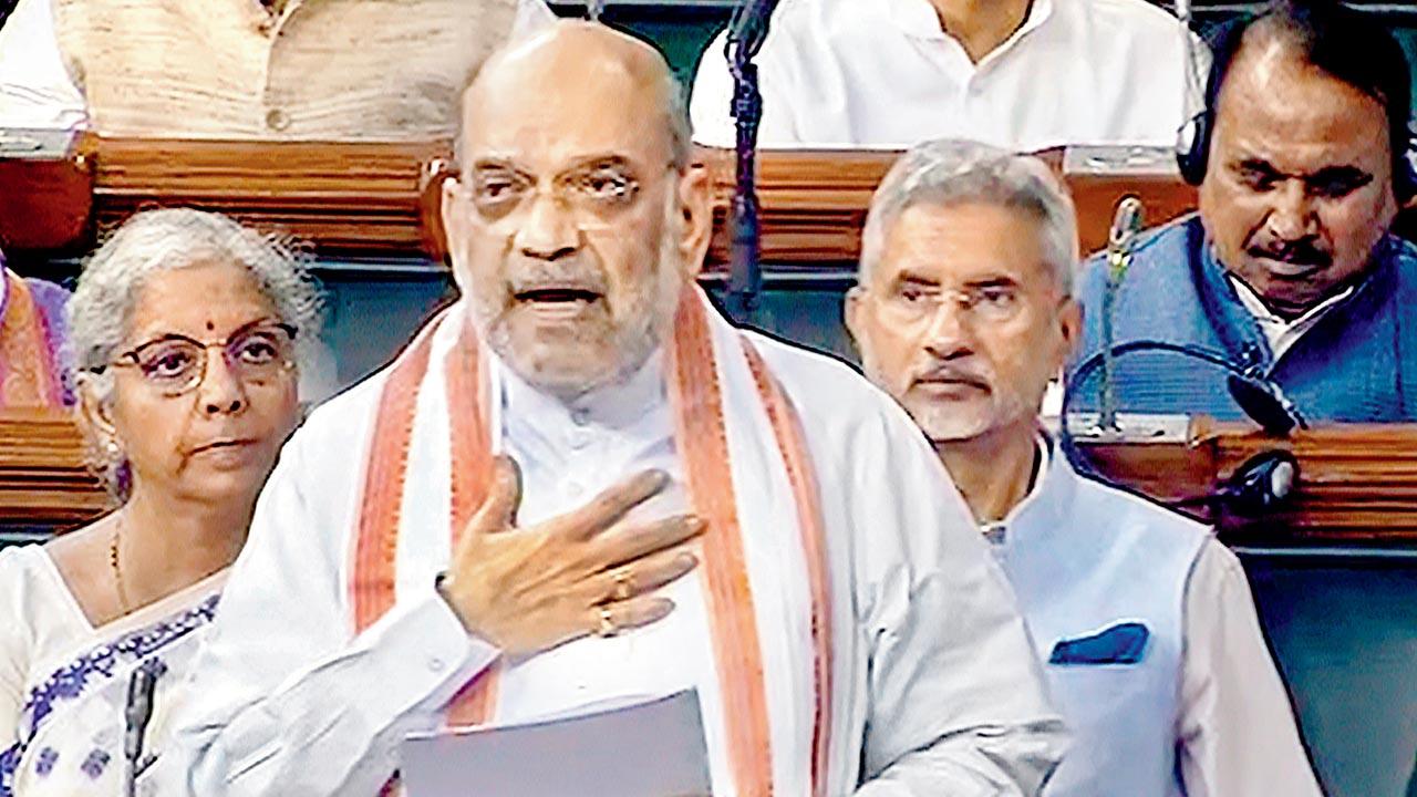 Union Home Minister Amit Shah speaks in the Lok Sabha, in New Delhi, on Friday. Pic/PTI