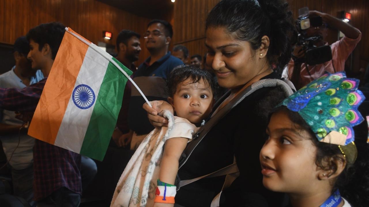 Dr Sonal Jain along with her 7.5-month-old child celebrating the success of ISRO at Nehru Science Center in Worli (Pic/Ashish Raje)