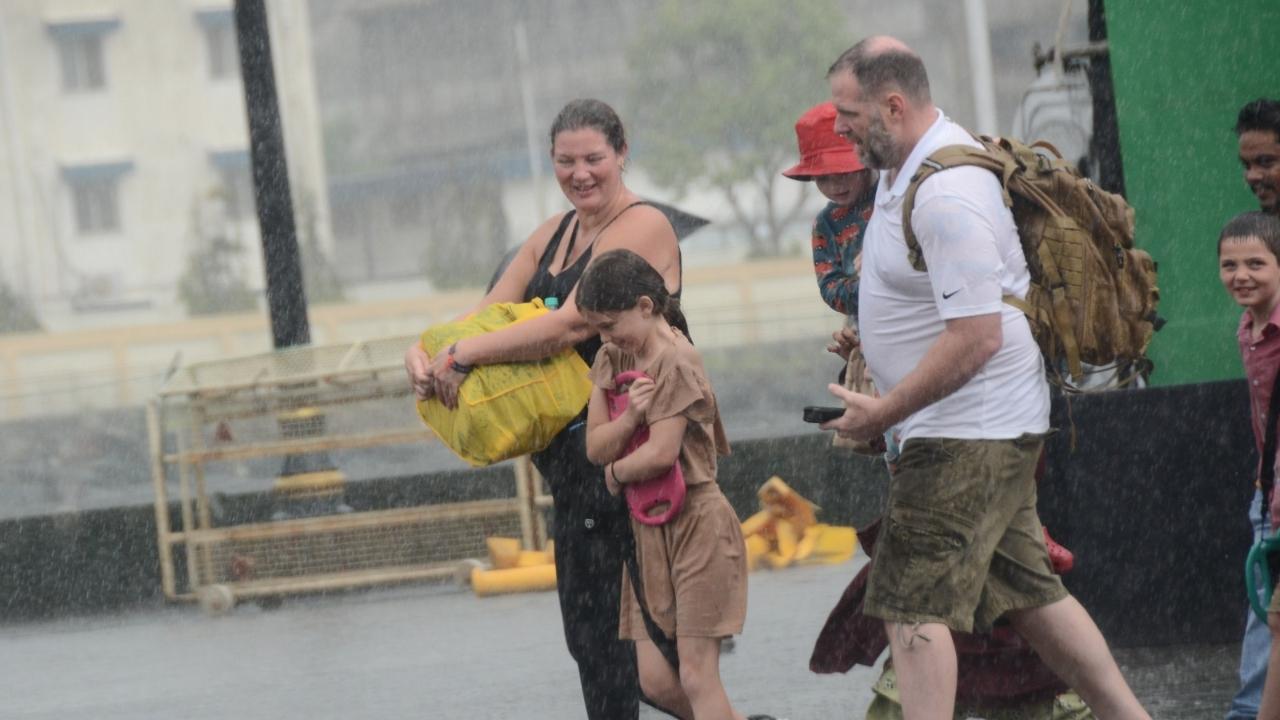 Foreign nationals visiting the heritage site were caught unawares in the Mumbai Rains