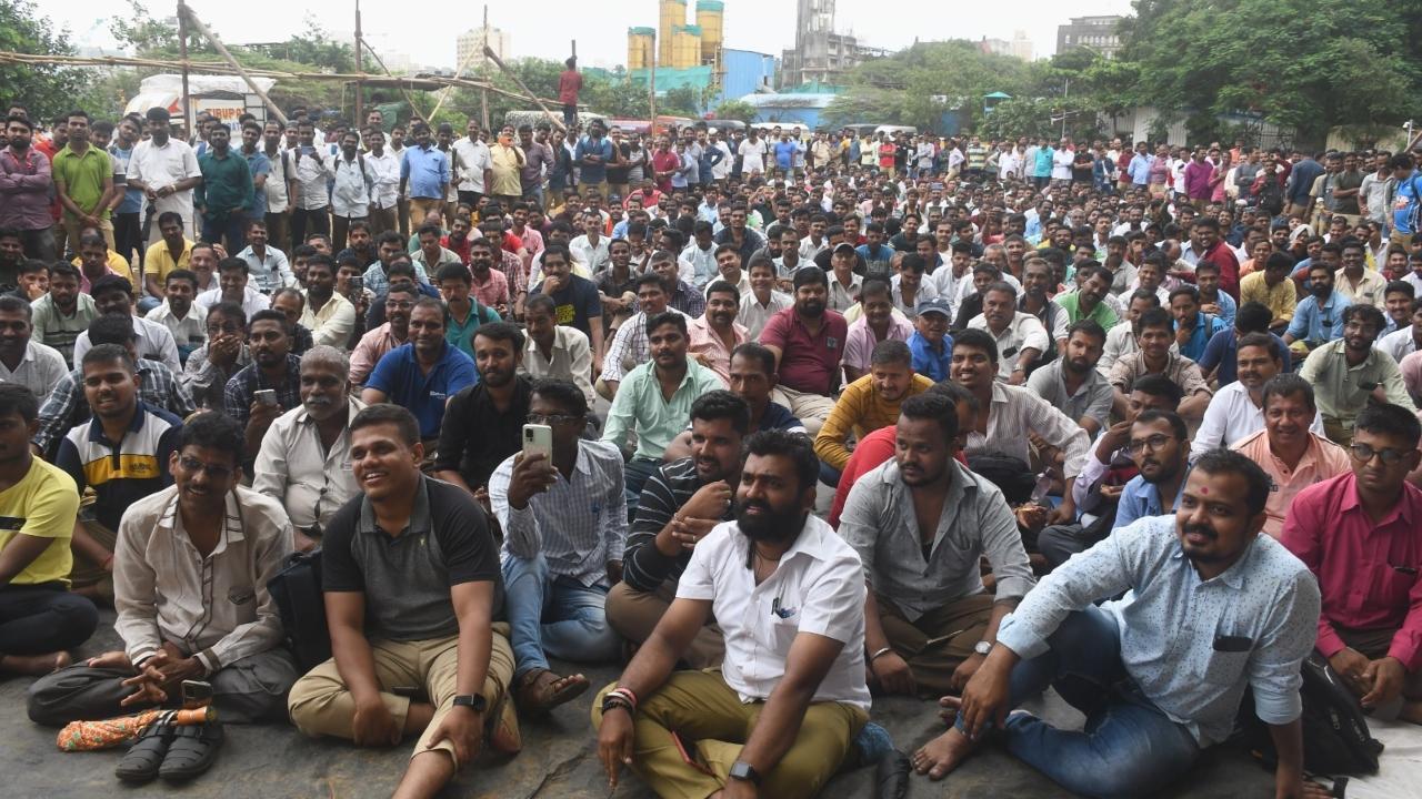 The striking workers on Friday staged a protest. Pics/Ashish Raje