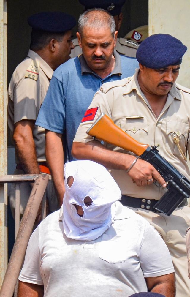 The police team had stopped them while they were carrying swords and trishuls to Nalhar temple, the police said