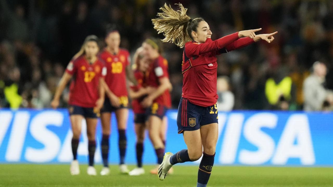 Spain’s Olga Carmona celebrates after scoring the opening goal during the final of Women’s World Cup soccer between Spain and England at Stadium Australia in Sydney, Australia, Sunday, Aug. 20, 2023. (AP Photo/Rick Rycroft)