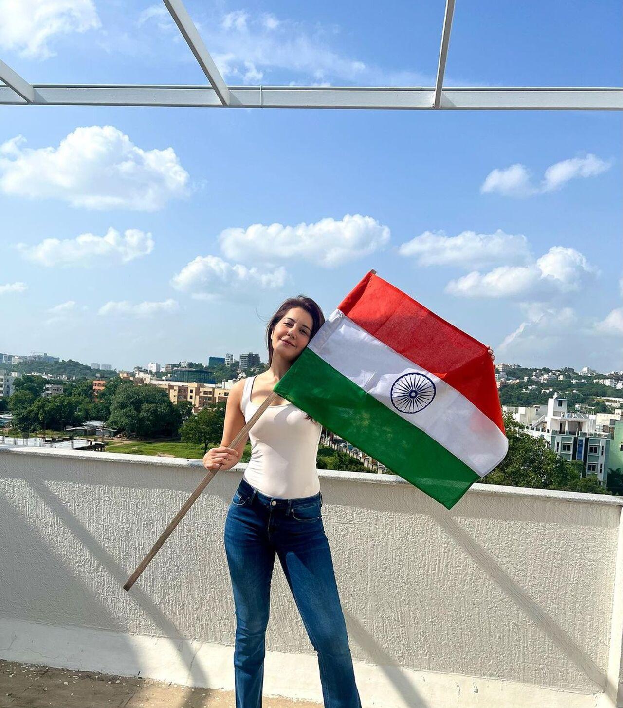 Actess Raashii Khanna took to her Instagram handle to share herself holding the Indian flag at waving it while standing on a terrace
