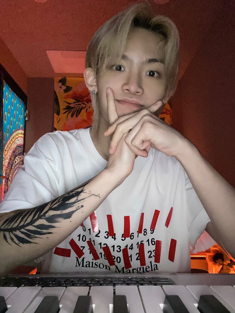 TO1's Chan
Chan boasts three distinct tattoos, each bearing a unique significance. One prominent design is a palm leaf on his forearm, symbolizing healing. This can often be seen during his performances and livestreams