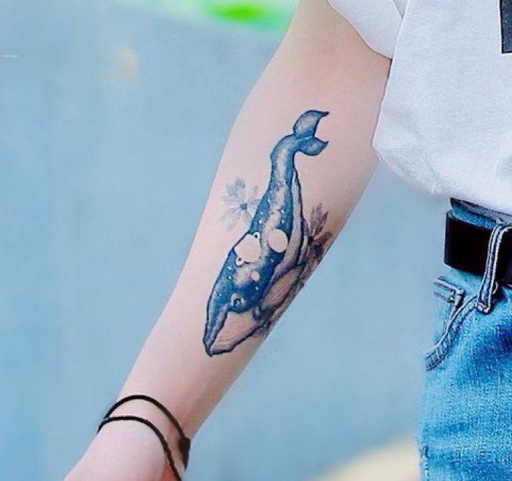 The next tattoo, an intricately designed whale on the inside of his forearm, stands as a testament to his deep affection for his elder sister. The last tattoo hasn't been properly glimpsed yet, but it appeared to be a bouquet of flowers on his upper back, symbolizing happiness.