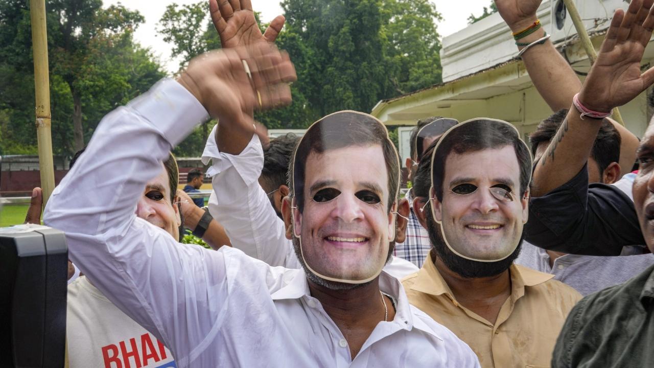 IN PHOTOS: Congress party workers celebrate after SC stays Rahul's conviction