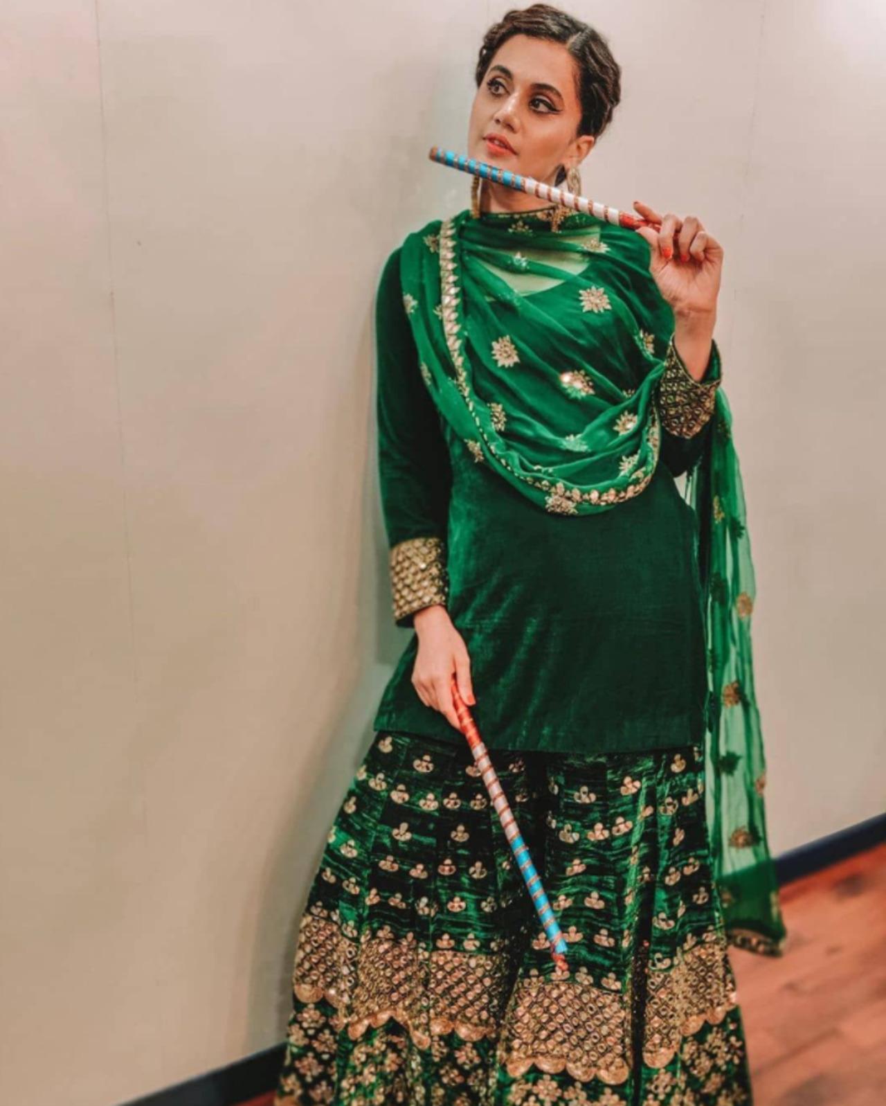 Taapsee Pannu looks Dandiya ready in her deep-green sharara and dupatta! Navratri is still a ways away, but why not take inspiration for Hariyali Teej from this glamorous yet elegant festival outfit?