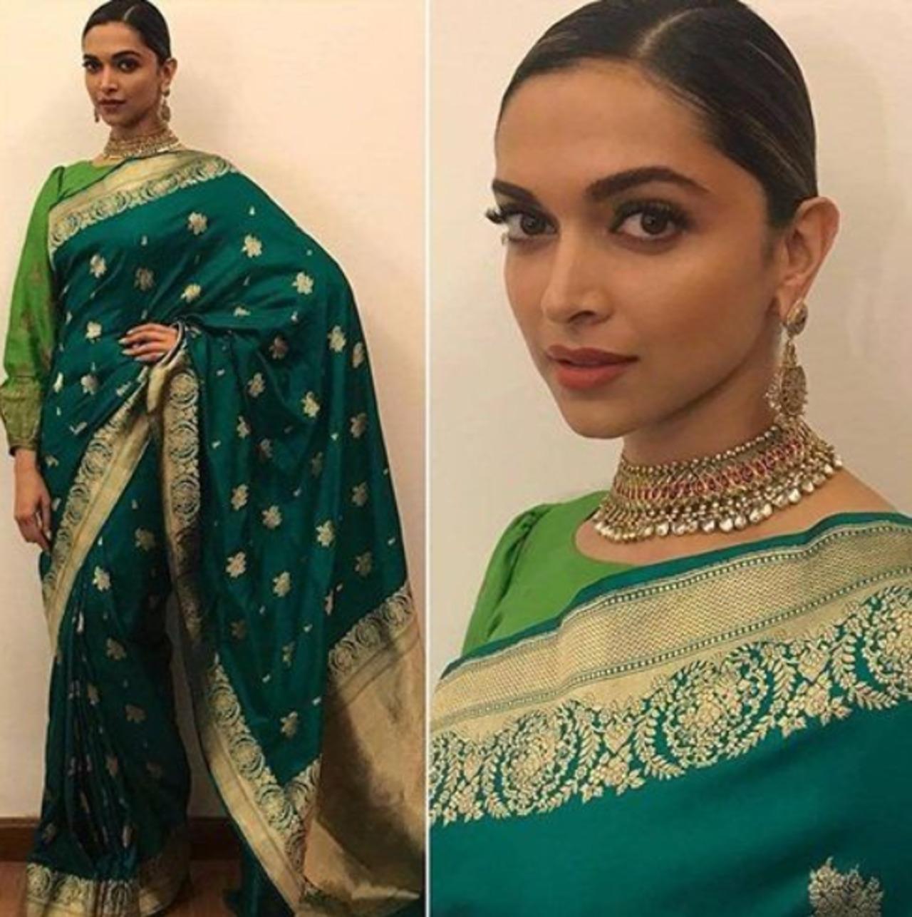 Who better to look towards when in a fashion dilemma than Bollywood's resident diva, Deepika Padukone? The actress looks simply stunning in any outfit she dons, be it modern or traditional. Her royal green and gold saree paired with a bun hairstyle makes for a stately ethnic outfit