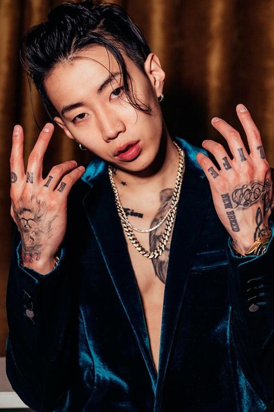 Jay Park
Jay Park often reveals his tattoos when he performs shirtless during concerts or music videos. He has a beautiful lion tattoo that spans his entire left pectoral muscle - and Jay Park is lion-hearted indeed! Further nods to his music journey include an AOMG tattoo on his leg, representing the entertainment agency he established, and 'New Breed' inked on his left hand, commemorating the title of his debut album.