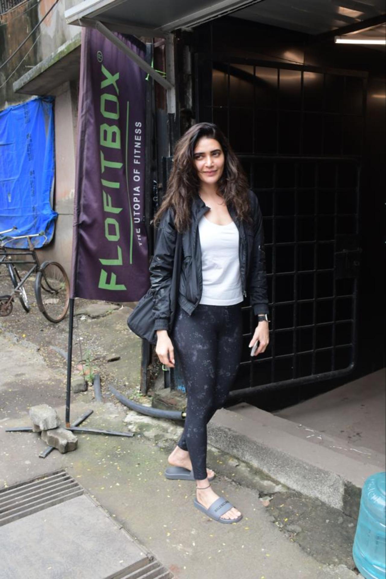 Karishma Tanna looked rejuvenated and glowing after her workout at a Bandra gym today