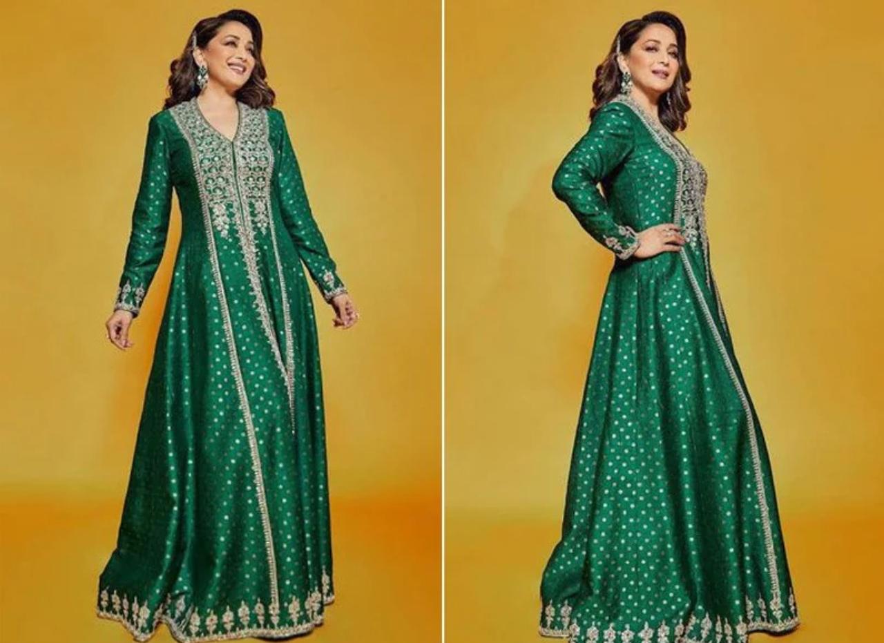 For a show-stopping look, consider Madhuri Dixit's emerald green anarkali sharara with royal gota patti work. Take a look at that painstaking embellishment! Pair with large earrings and soft blush makeup - and we are sure you will stand out during Teej festivities