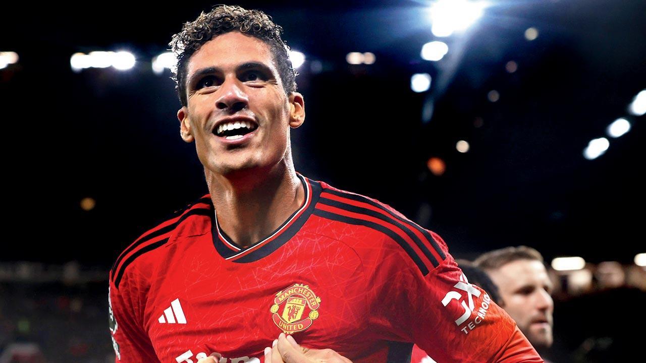 Raphael Varane’s header gives Manchester United winning start